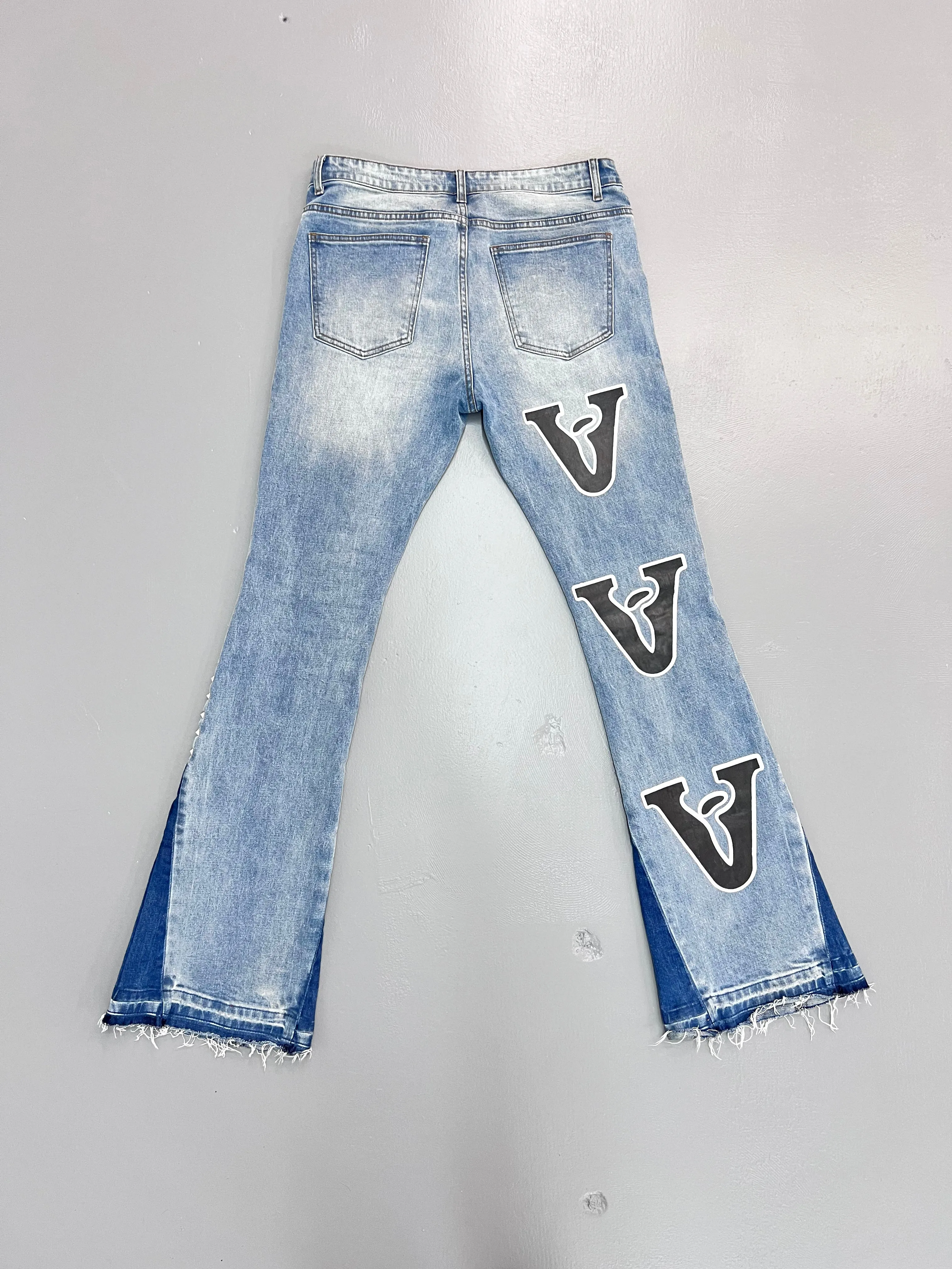 STAR STUDDED FLARE JEANS